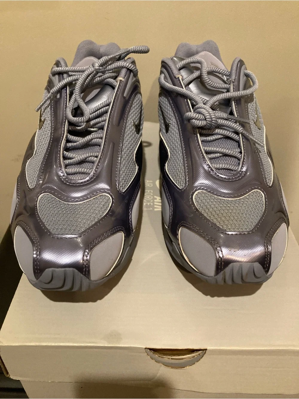 Nike Women’s Metallic Silver and Grey Runner Sneakers